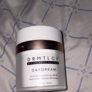 DRMTLGY Daydream Broad Spectrum Sunscreen SPF 40 - White and Brown